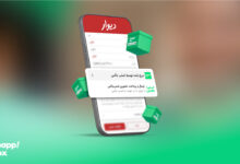 یک گوشی هوشمند که افزونهی اسنپباکس در دیوار را نشان میدهد